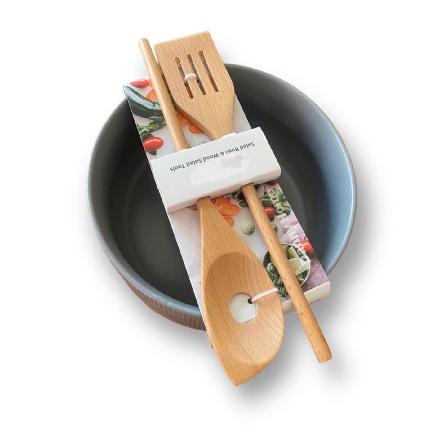 Salad ceramic bowl with wooden utensils