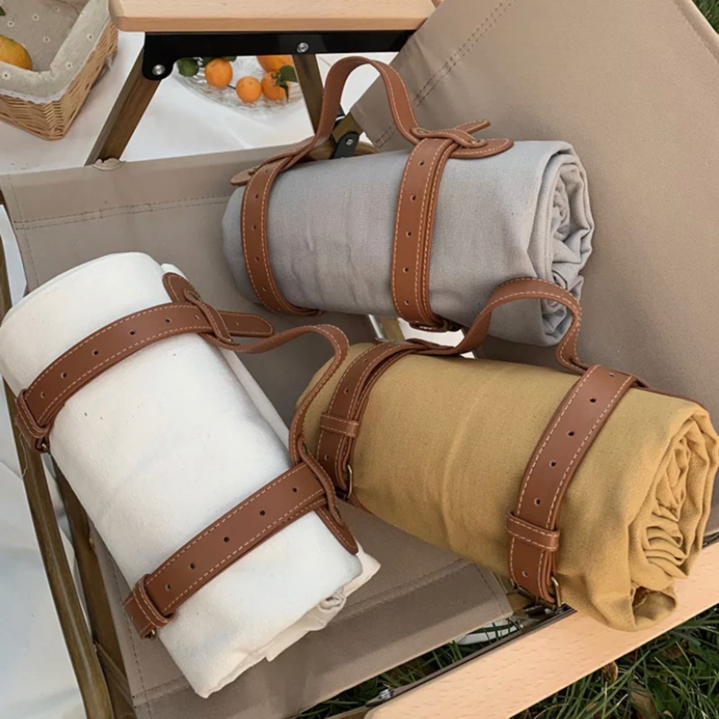 Duffle picnic mat with leather strap